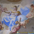 Faith is surrounded by four groups of angels, who represent the four Cardinal Virtues: Wisdom, Justice, Fortitude and Temperance
