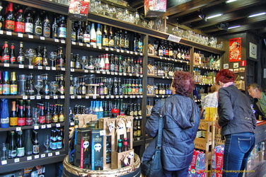 Shelves of some 100 different beers at Abbey No. 8
