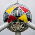 The Belgian flag draped sphere at the top of the Atomium