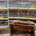 The scene behind the scaffolding shows the Duke of Wellington and his staff