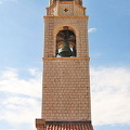 See Maro and Baro strike the bell on the hour