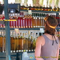 Colourful bottles of travarica - a herbal rakia or grappa