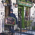 A real Bobby arriving at the Sherlock Holmes Museum
