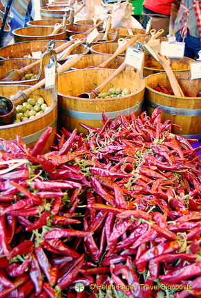 Tubs of olives and chillis - my kind of stall