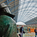 Sir John Betjeman marvelling at the roof of St Pancras
