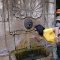 Drinking off a water fountain in Annecy