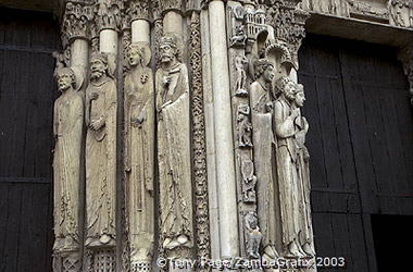 Elongated statues on the Royal Portal 