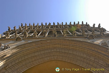 Gargoyles abound on the facade of Notre Dame de Dijon