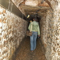Tony walking through the Catacombes galleries