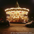 On a Carousel next to the Eiffel Tower 