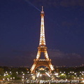 The Eiffel Tower sparkles by night
