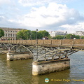 Those in love come to attach a padlock on the Pont des Arts to seal their love