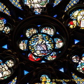 Close-up of the rose window. In the centre is Christ returned to judge the dead and the living