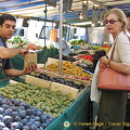 Caroline shopping for some fruit