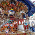 Children enjoying carousel rides