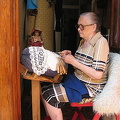 Look into doorways and you never know what you may see.  This lady was doing her crochet