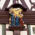 1581 wooden house with statues including Christ as a child