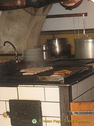 Sausages being cooked