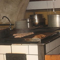 Sausages being cooked