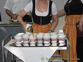Asbach Uralt is poured into porcelain pots for Rudesheim coffee
