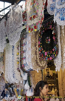 Me checking out the embroidered blouses and lacework