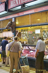 If you don't speak the language, the animal head gives a hint of what meat is sold here