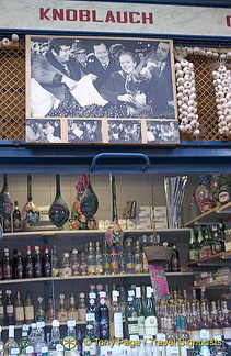 Is he suggesting that Mrs. T should consider spicing up English food with some knoblauch?