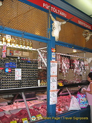If you don't speak the language, the animal head provides a clue of what meat is sold here