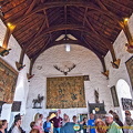 The walls of the Great Hall covered with tapestries