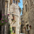 Medieval cobbled street leading to Rocca Maggiore
