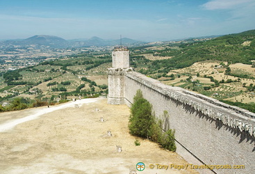 Long wall leading to the tower