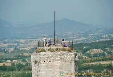 At the top of the Rocca Maggiore tower