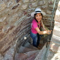 Squeezing my way down the spiral staircase of La Rocca