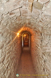 A long and narrow passage to the Rocca Maggiore tower