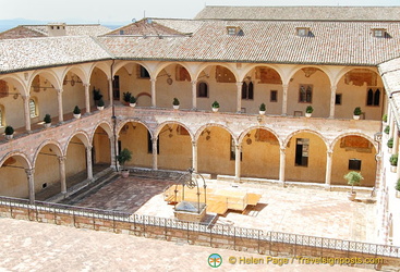 Courtyard of the Sacro Convento friary with 53 Romanesque arches