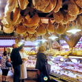 Legs of Parma ham decorate the ceiling of La Baita