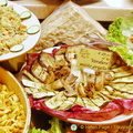 Grilled vegetables and other food in Bologna