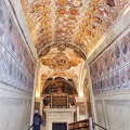 Highly decorated walls and ceiling of the staircase to the Anatomical Theatre