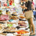 Buying some sweet treats at the Santo Spirito market