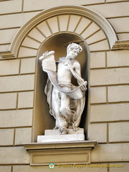 Statue of St Mark on the facade of the church