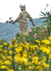 Beautiful flowers and statue in Isola Bella gardens