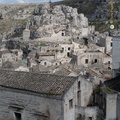 The town of Matera is perched on the edge of a deep ravine