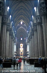 The aisles are divided by giant pillars and lit from all sides by excellent stained glass
[Duomo - Milan - Italy]