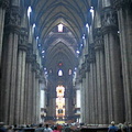 The aisles are divided by giant pillars and lit from all sides by excellent stained glass
[Duomo - Milan - Italy]