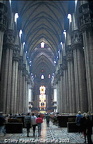 The aisles are divided by giant pillars and lit from all sides by excellent stained glass
[Duomo - Milan - Italy]