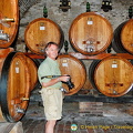 Tony checking out the wine barrels