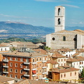 View of Chiesa di San Domenico and M.Gavallo and M.Vettore in the background