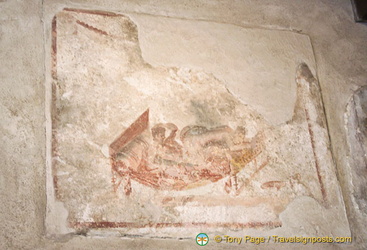 Erotic images like this can be seen over the entrance to each Lupanar room