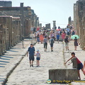Via dell'Abbondanza, the main thoroughfare in Pompeii