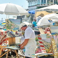 An artist at work on Positano beach